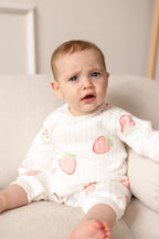 The Strawberry Boucle Wrap Baby Grow Romper
