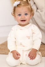 The Rainbow Boucle Wrap Baby Grow Romper