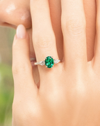 Emerald Oval Cut Three Stone Engagement Ring in Sterling Silver