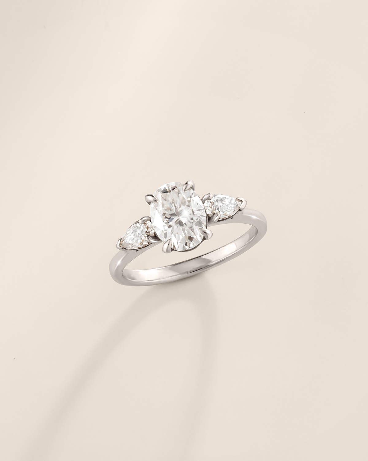 2 ct Oval Moissanite Three Stone Engagement Ring in Sterling Silver
