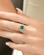 Emerald Round Cut Three Stone Engagement Ring in Sterling Silver