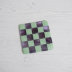 Fused Glass Coaster – Mint Green & Lavender Chequered Design by David Perry Glass & Ceramics (10cm-mint-green-transparent-lavender-with-amethyst-white-chequered-coaster-bullseye-collection)