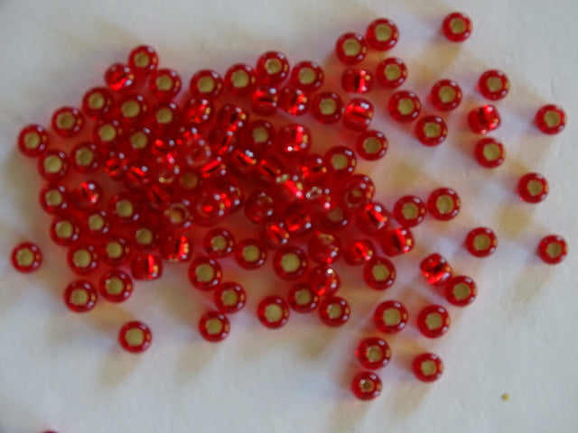 Toho size 8 Silver Lined Ruby