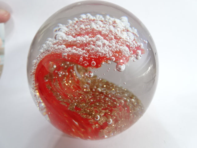 Beautiful 'Red Golden GlitterWave Paperweight.  (8cm app Dia)