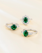 Emerald Oval Cut Three Stone Engagement Ring in Sterling Silver
