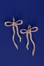 Pearlescent Beige Dangly Bow Hoop Earrings