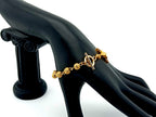 18K Gold cubic zirconia single decade rosary bracelet with gold plated Saint Benedict crucifix.