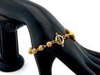 18K Gold cubic zirconia single decade rosary bracelet with gold plated Saint Benedict crucifix.