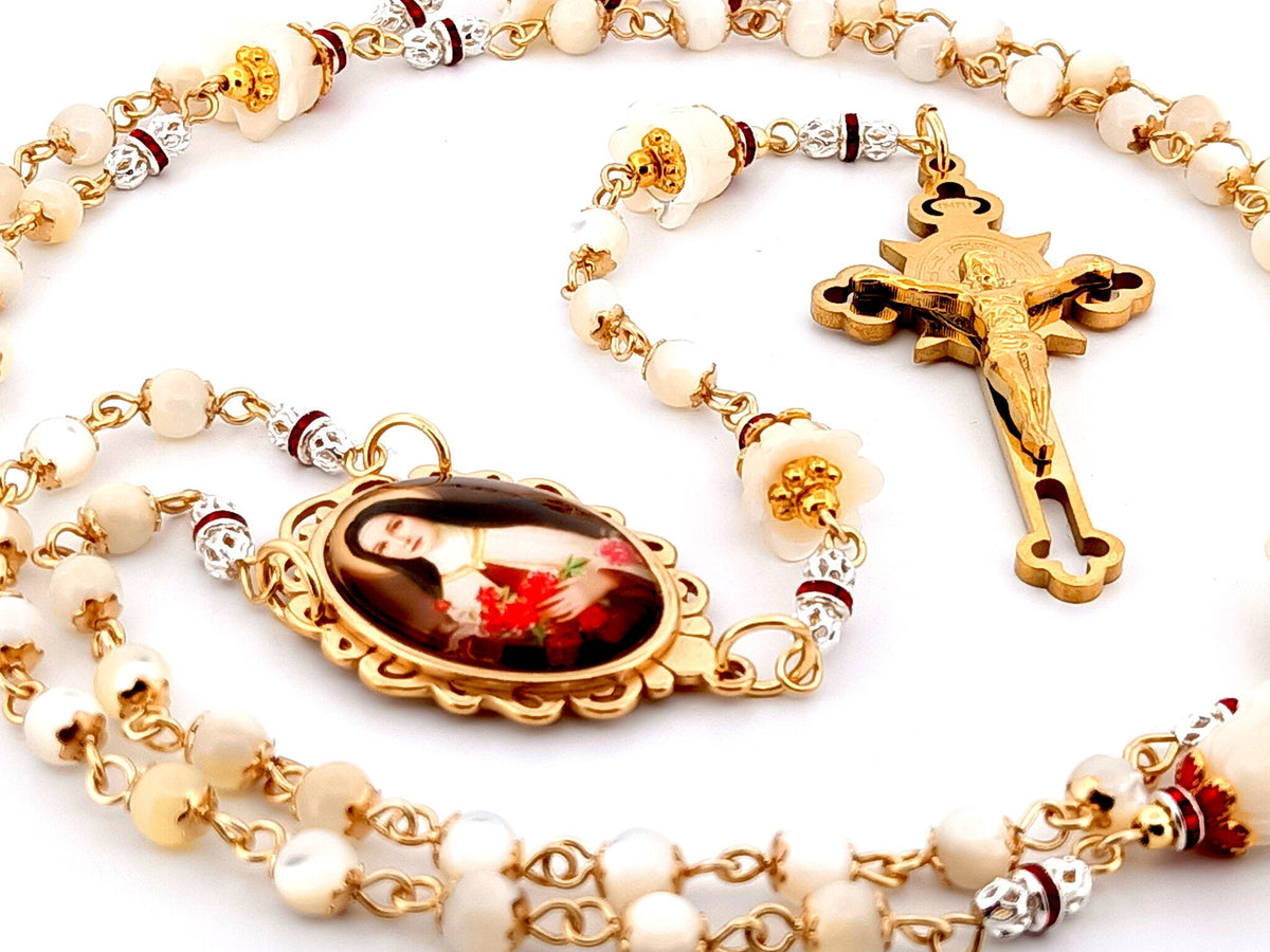 Saint Therese of Lisieux mother of pearl rosary beads with gold plated Saint Benedict crucifix.