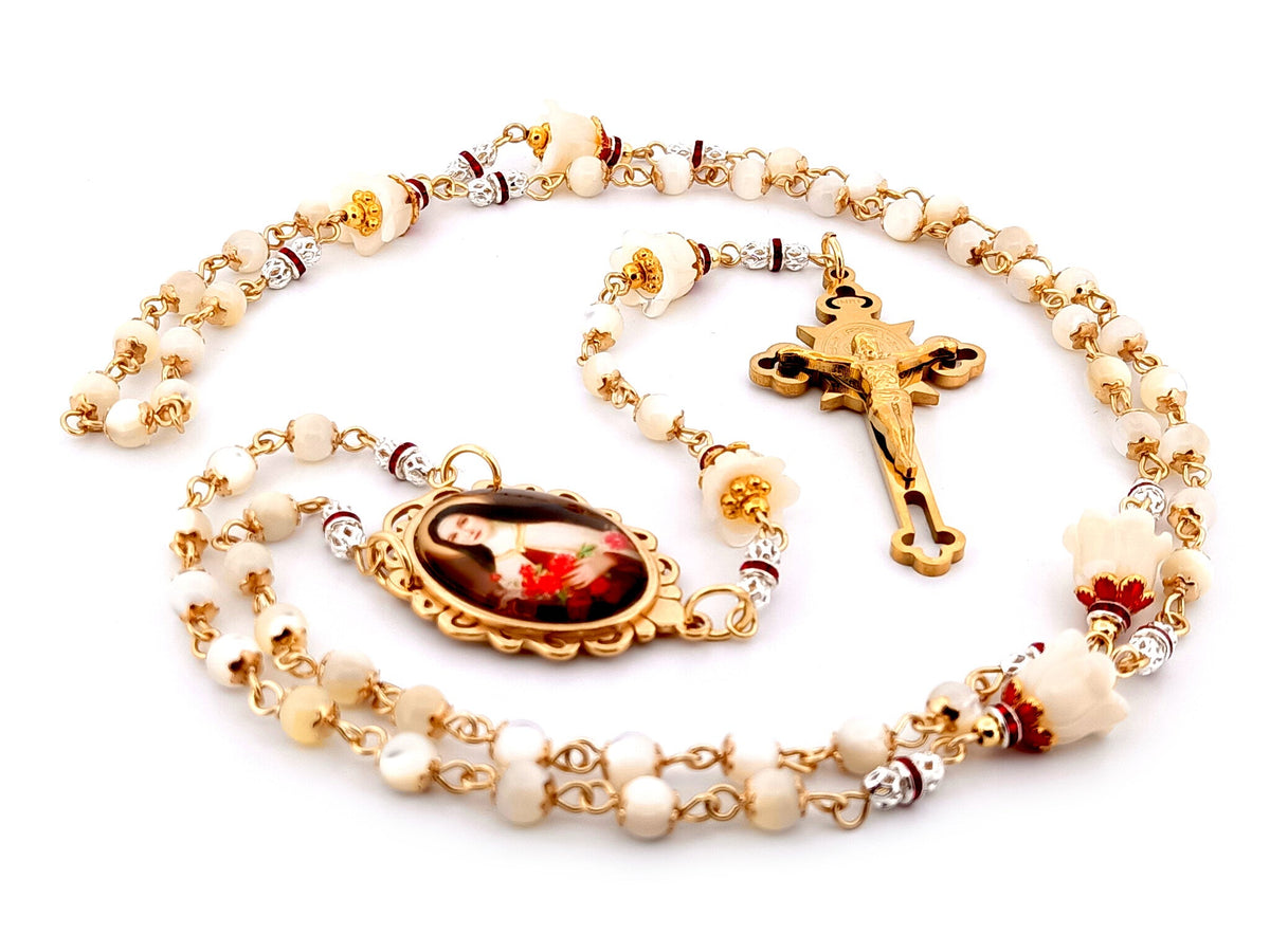 Saint Therese of Lisieux mother of pearl rosary beads with gold plated Saint Benedict crucifix.