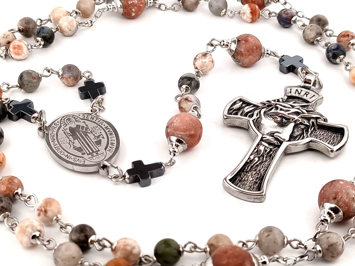 Saint Benedict rhodonite and sesame jasper gemstone rosary beads with stainless steel crown of thorns crucifix.