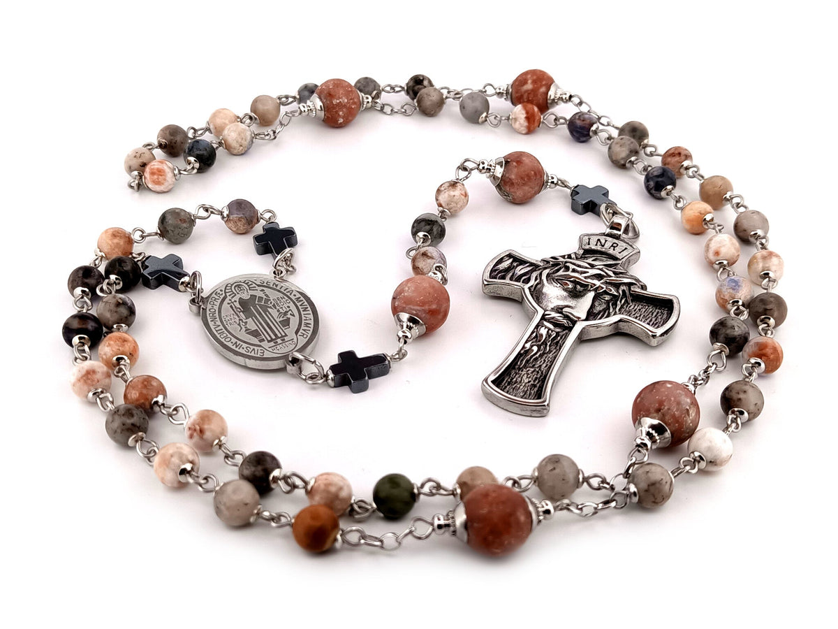 Saint Benedict rhodonite and sesame jasper gemstone rosary beads with stainless steel crown of thorns crucifix.