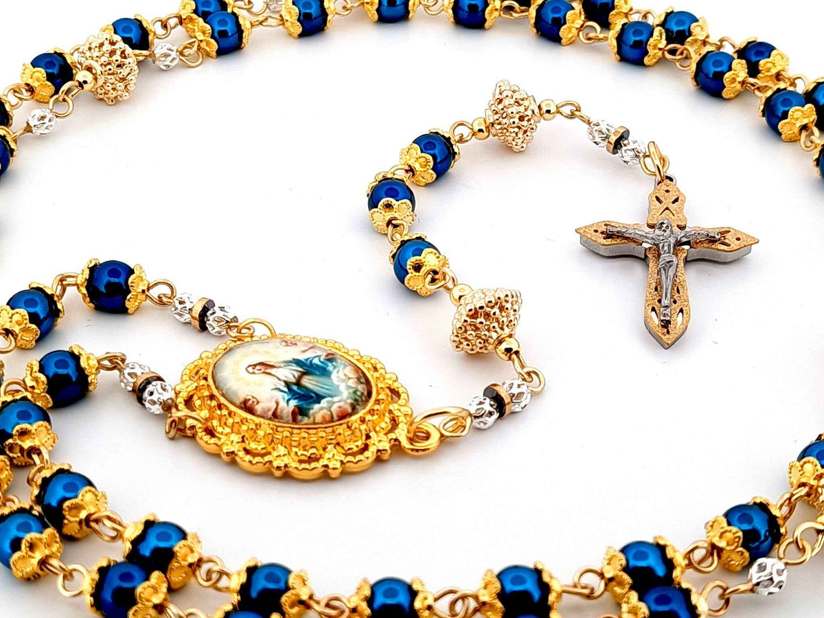 The Assumption of Mary blue hematite gemstone and gold rosary beads with layered stainless steel crucifix.