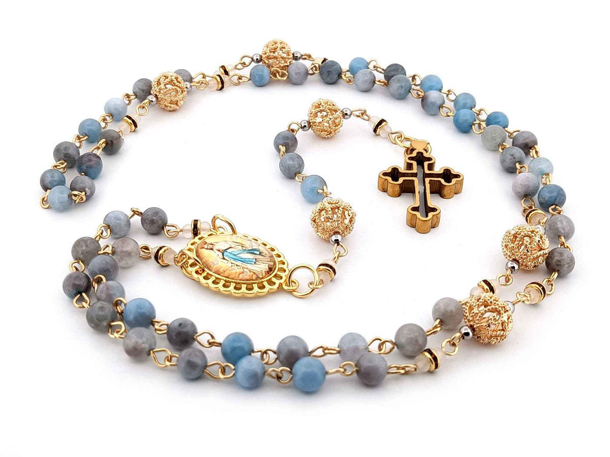 Immaculate Conception aqua marine gemstone and 18K gold rosary beads with gold plated 3D cross.