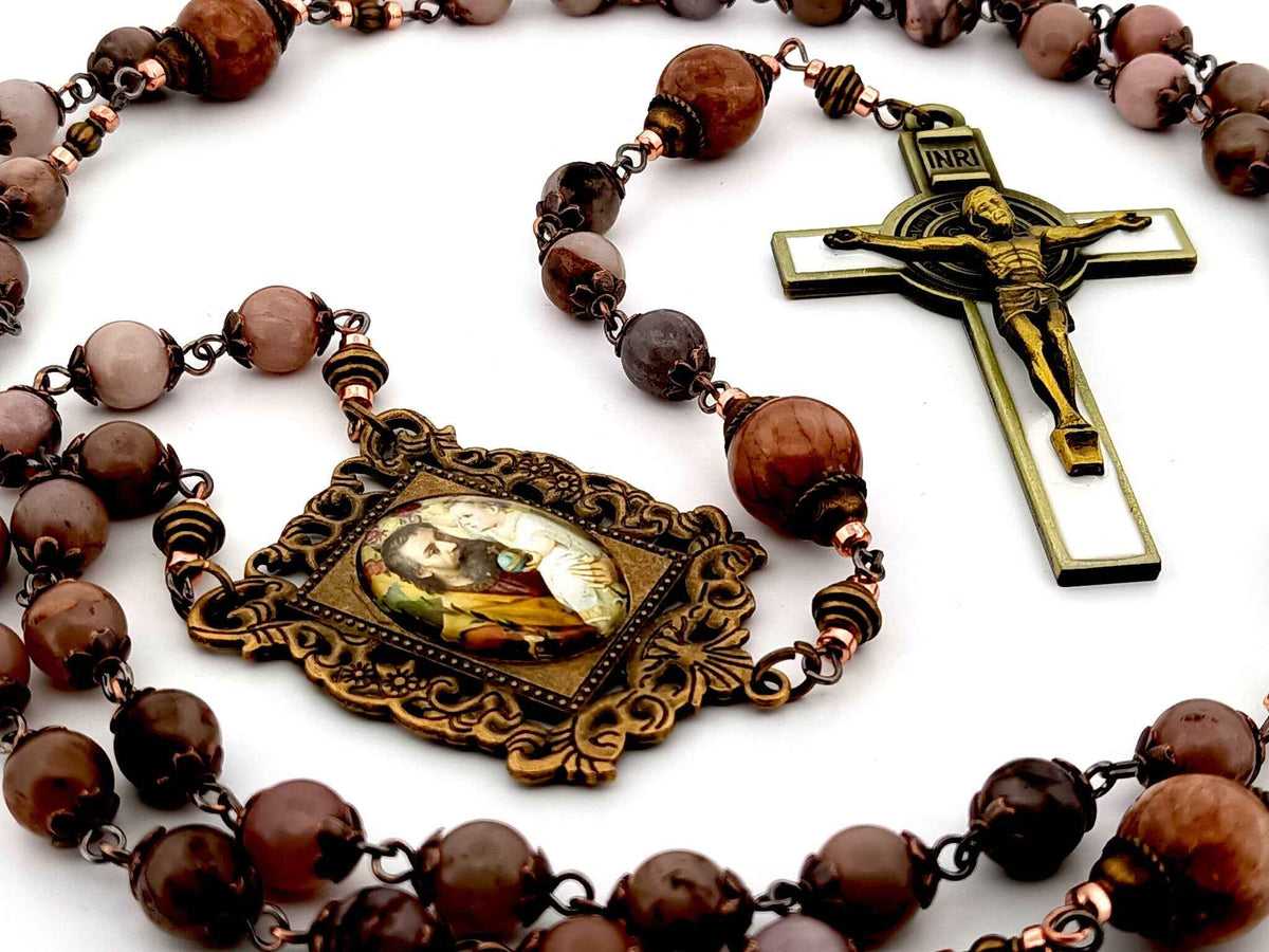 Saint Joseph rhodonite and jasper gemstone rosary beads with white enamel brass Saint Benedict crucifix.