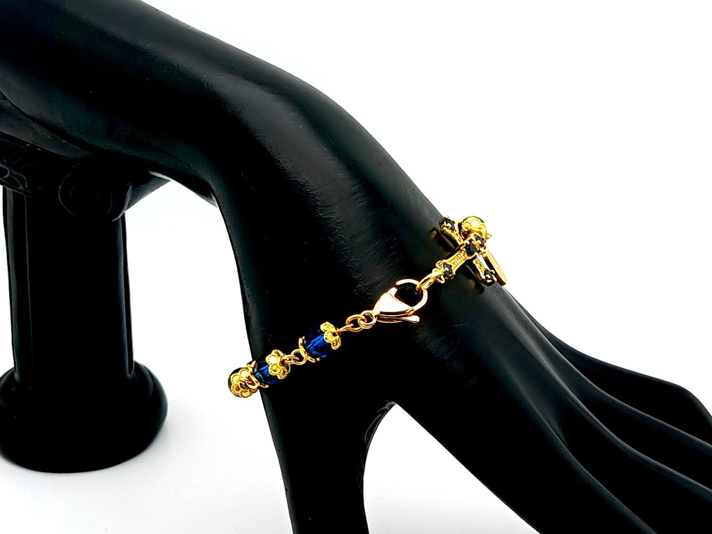 Miraculous medal blue Preciosa crystal single decade rosary bead bracelet with 18ct gold cubic zirconia cross.