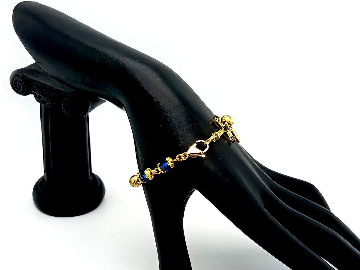Miraculous medal blue Preciosa crystal single decade rosary bead bracelet with 18ct gold cubic zirconia cross.