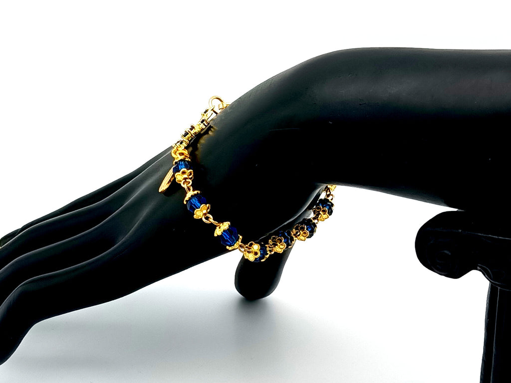 Miraculous medal blue Preciosa crystal single decade rosary bead bracelet with 18ct gold cubic zirconia cross.