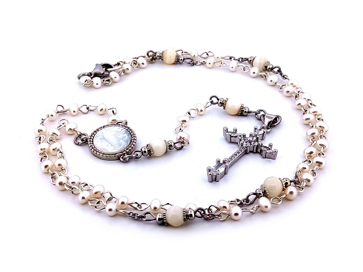 Our Lady of Fatima fresh water pearl rosary beads necklace with cubic zirconia cross.