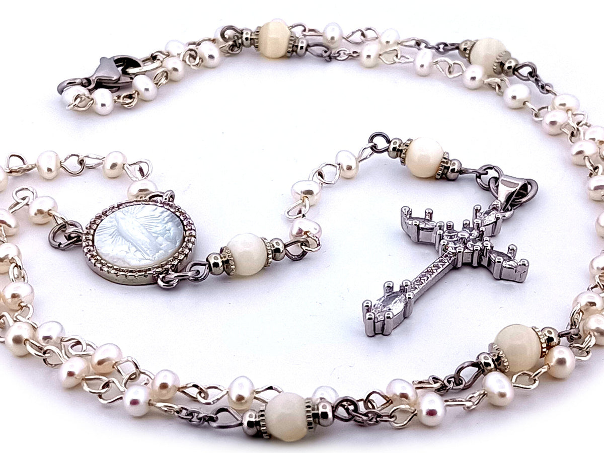 Our Lady of Fatima fresh water pearl rosary beads necklace with cubic zirconia cross.