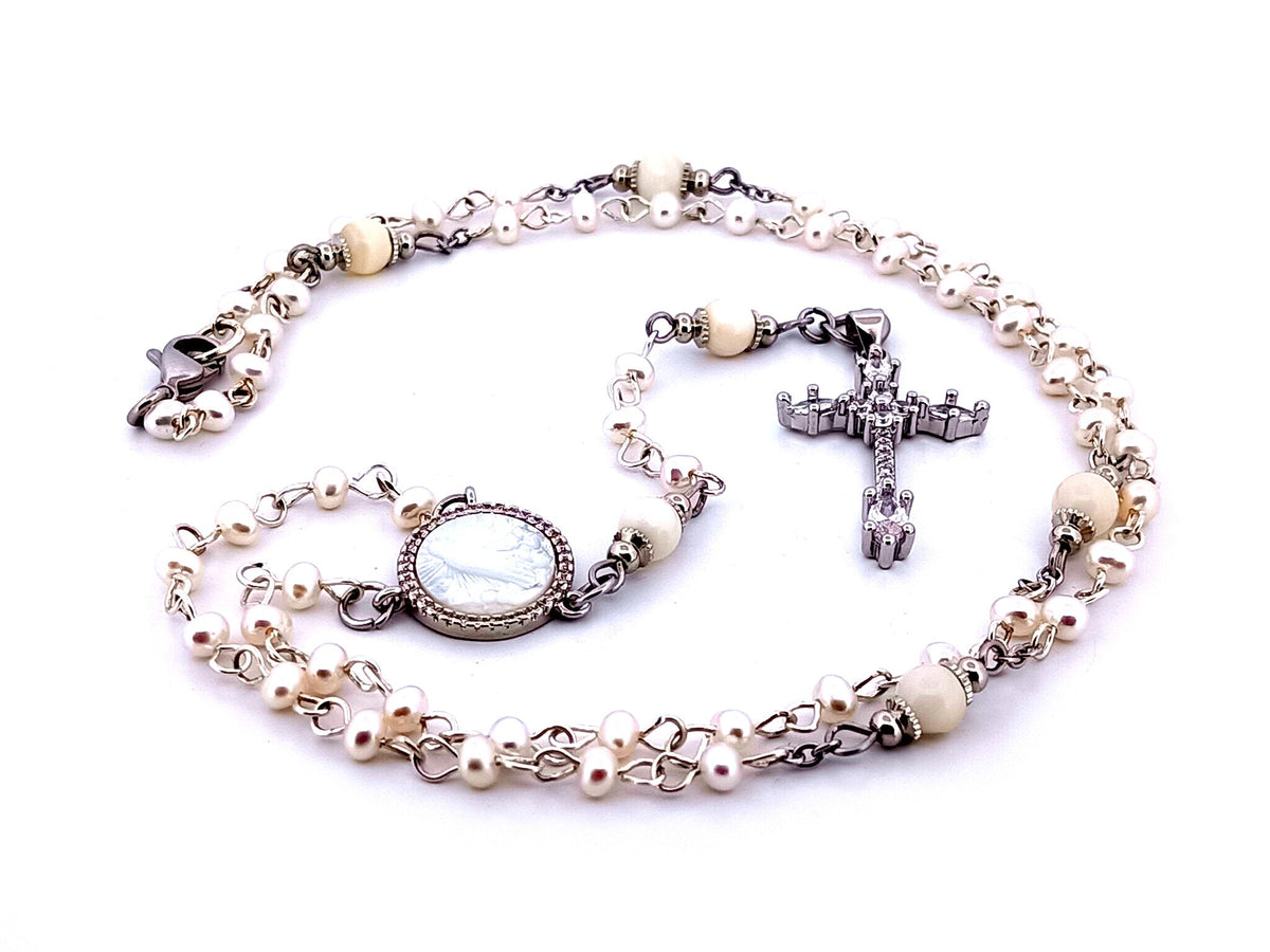 Our Lady of Fatima fresh water pearl rosary beads necklace with cubic zirconia cross.