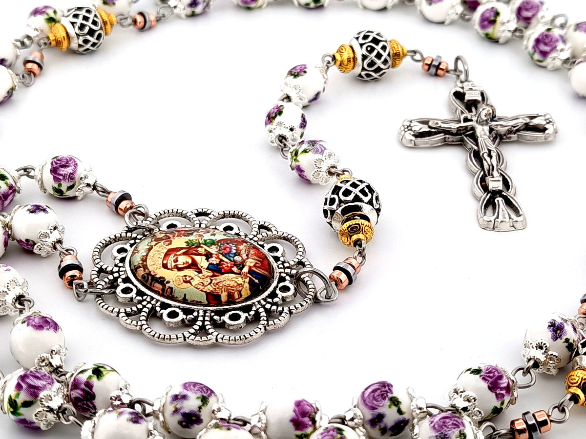Our Lady of Perpetual Help purple floral porcelain and silver rosary beads with silver lily crucifix.