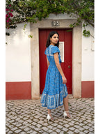 Mela Blue Ditsy Print Sun Dress With Cross Over Back Tie Front And Dip Hem