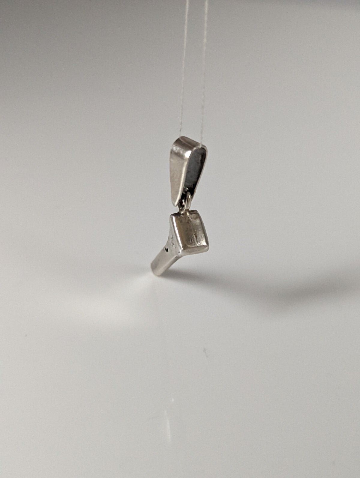 Silver Steed Horseshoe Nail Silver Pendant