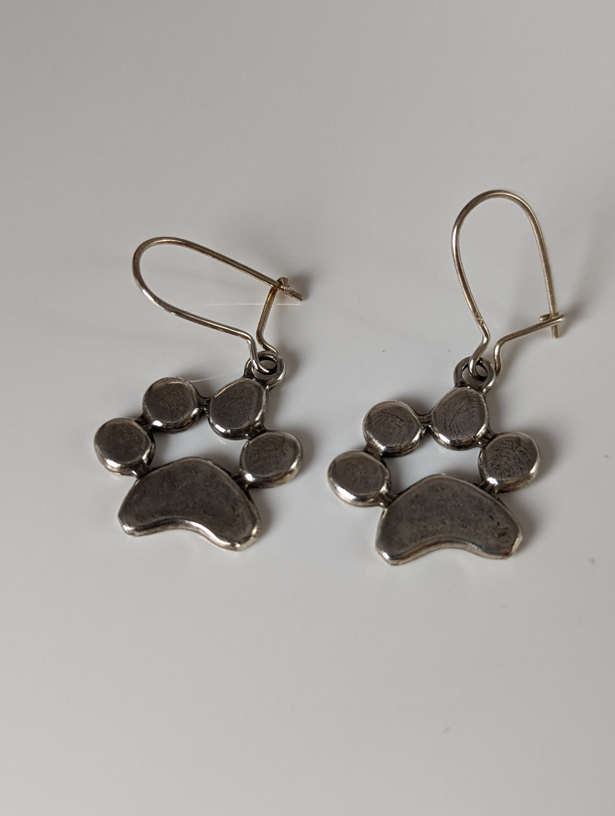 Silver Steed Paw Print Silver Dropped Earrings