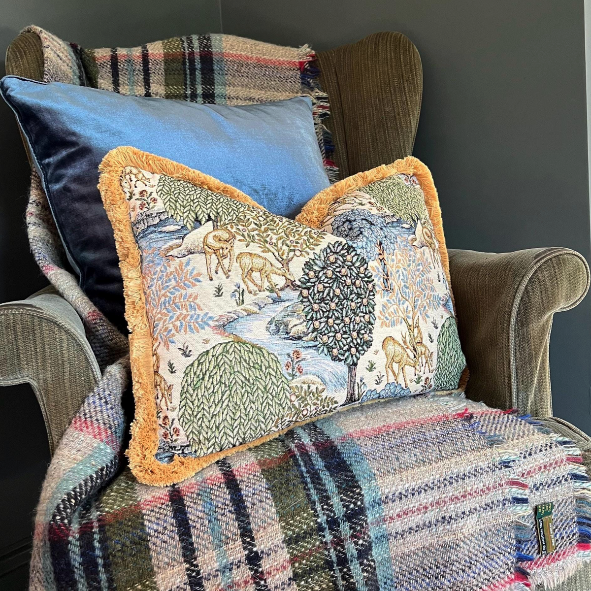 William Morris Deer garden tapestry cushion with mustard gold fringing