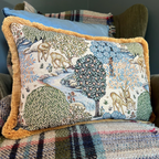 William Morris Deer garden tapestry cushion with mustard gold fringing