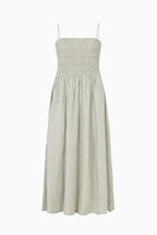 The Harlow Smocked Maxi Dress in striped olive green