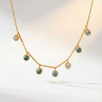 Gold Aqua Necklace with Barnacles and Rainbow Topaz