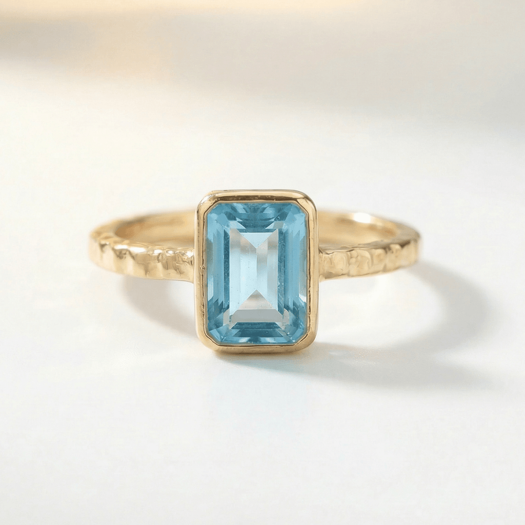 Tidewashed Sky Blue Topaz Ring – Octagonal Gemstone & Hammered Band